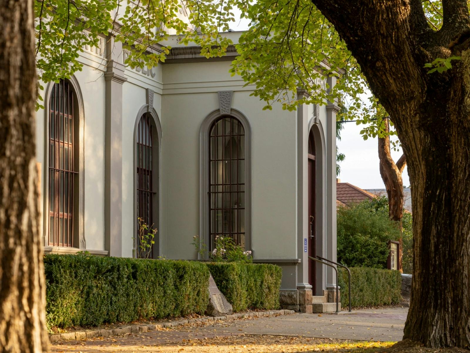 The Burke Museum Beechworth front facade from left angle through trees