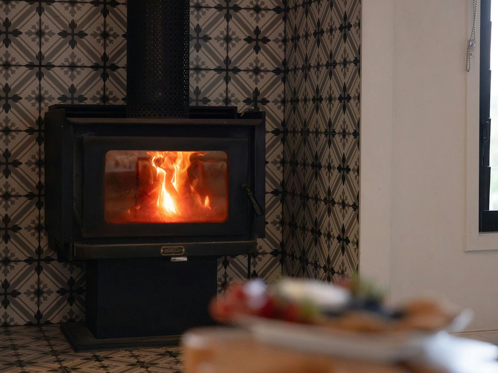 Enjoy a cozy wood fire in the privacy of the cabin at Tallaringa Views with firewood supplied