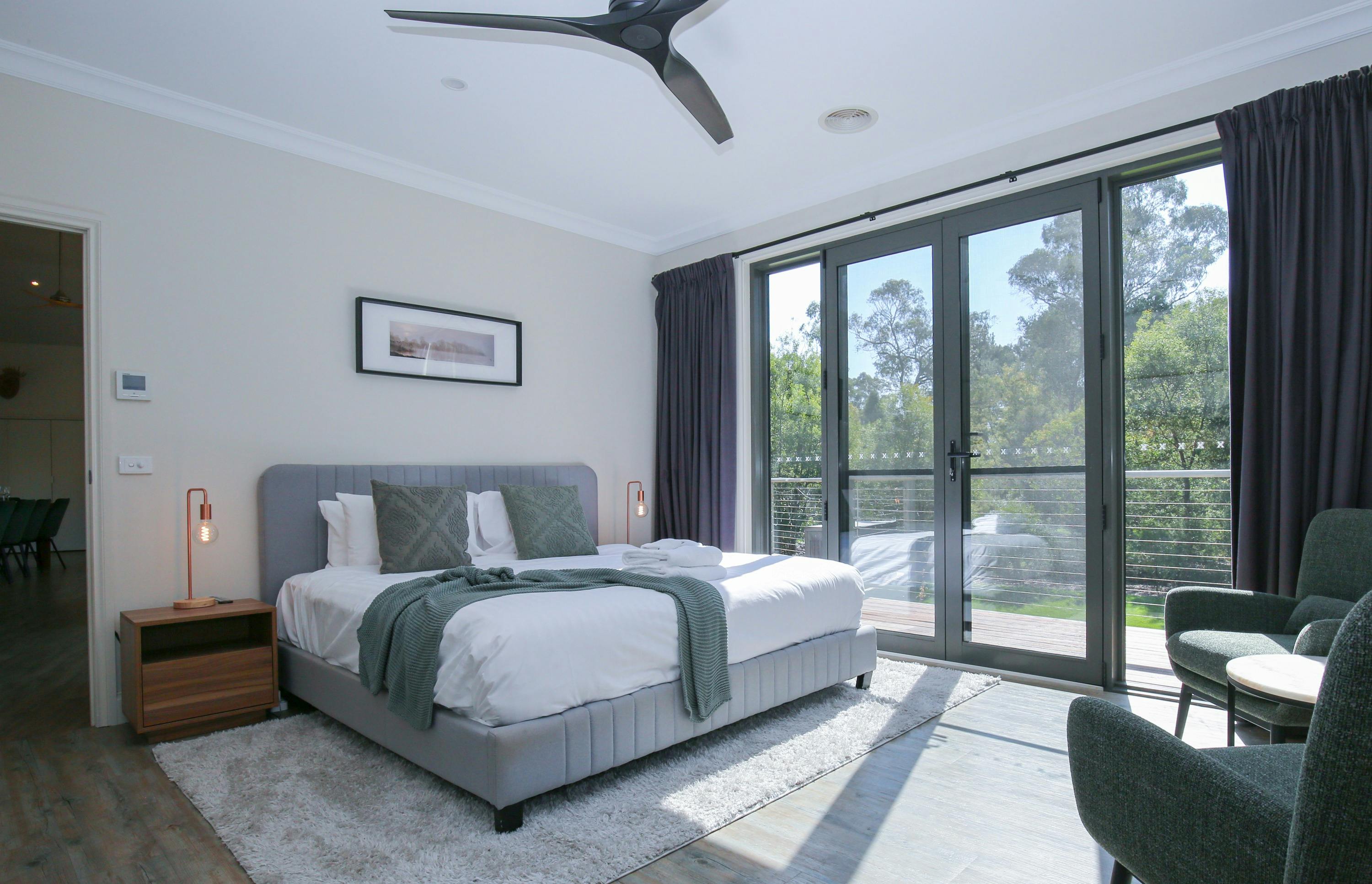 Northern Exposure Bright bedroom featuring large windows