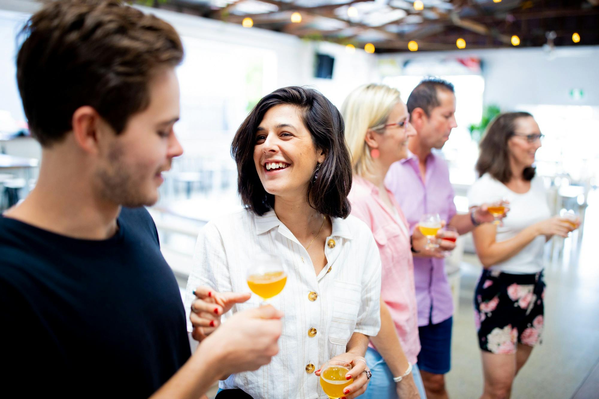 Friends enjoying beers at Precinct