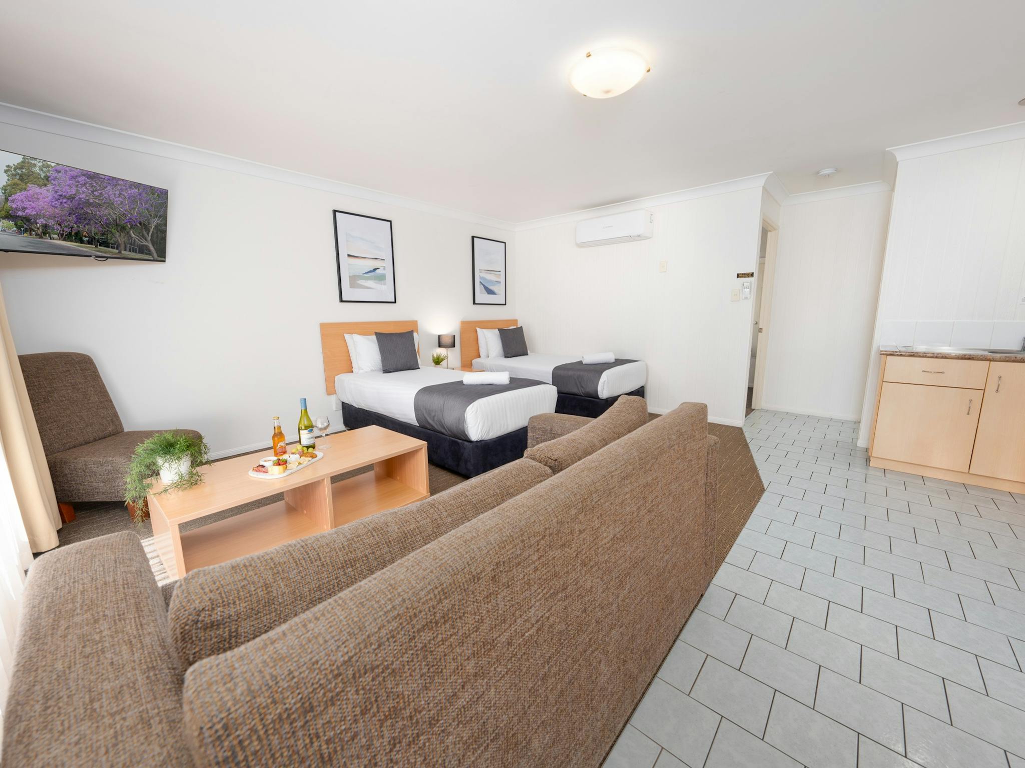 Open living with lounge area and 2 Single Beds Open living with lounge area and 2 Single Beds