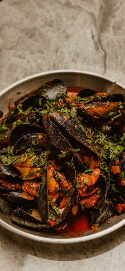 mussels, nduja sauce, coriander
