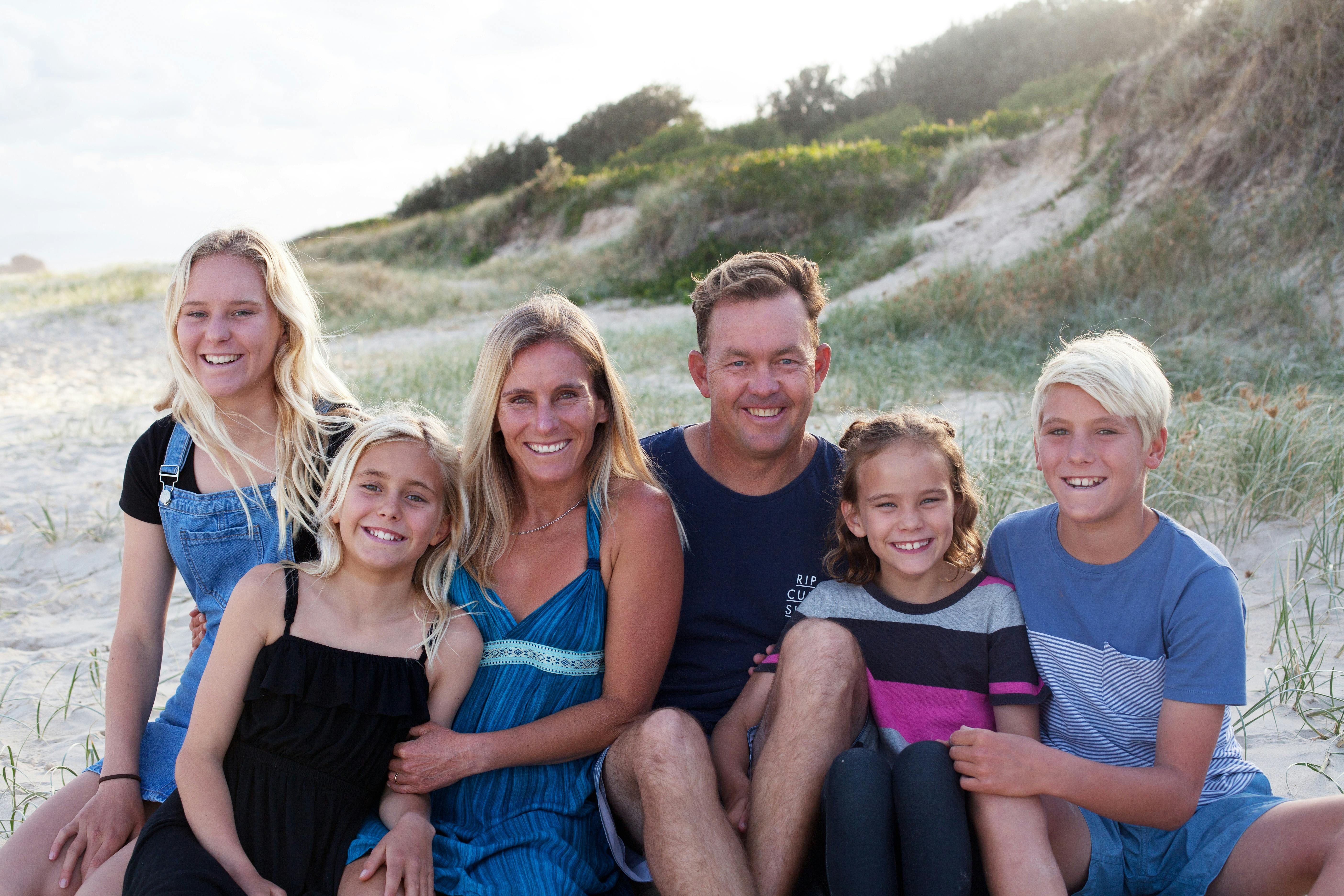 A surfing family with four children who all love surfing