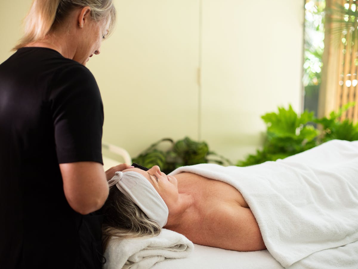 woman getting a facial using eminence products woman getting a facial using eminence products