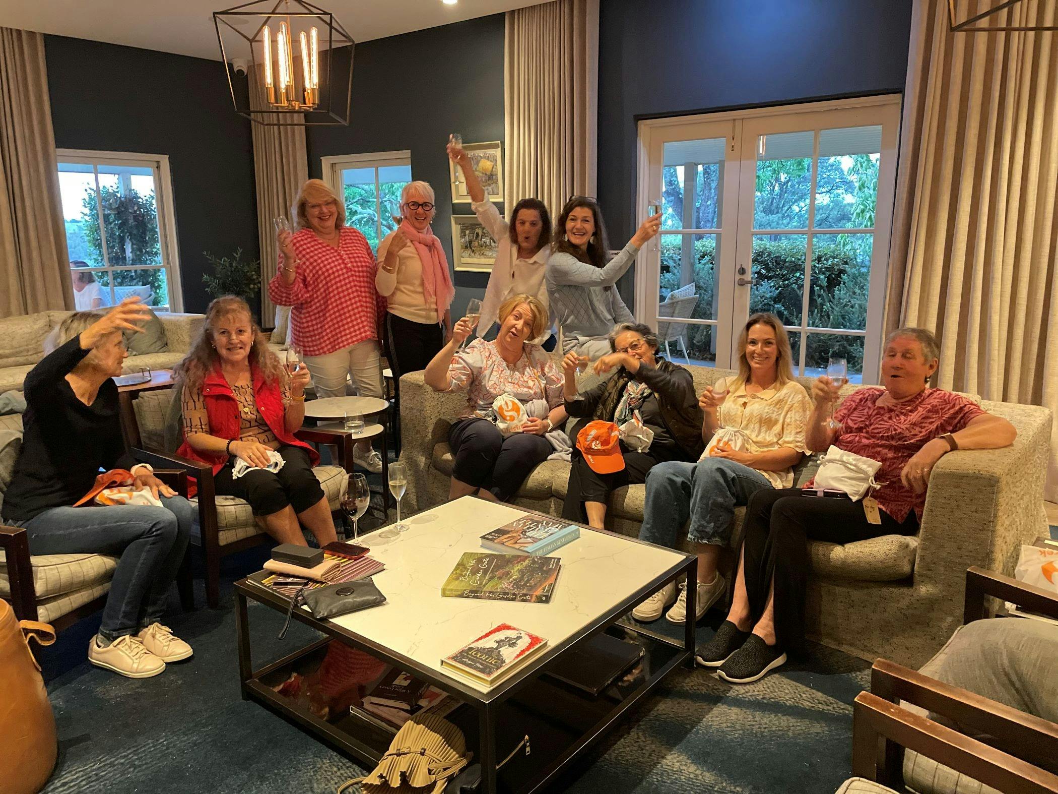 Gathering with wine and snacks to celebrate