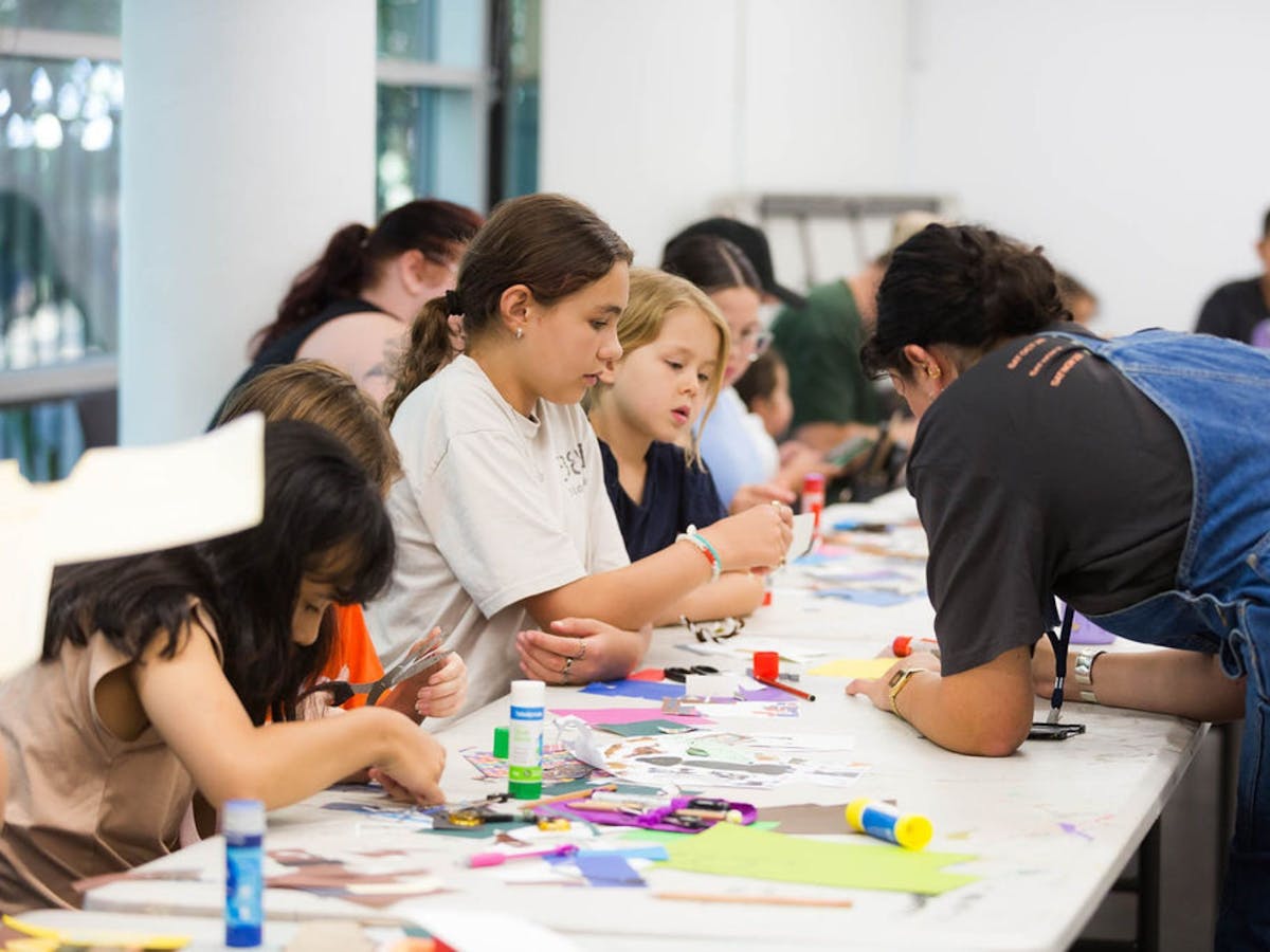 Photograph of children creating art in a workshop space