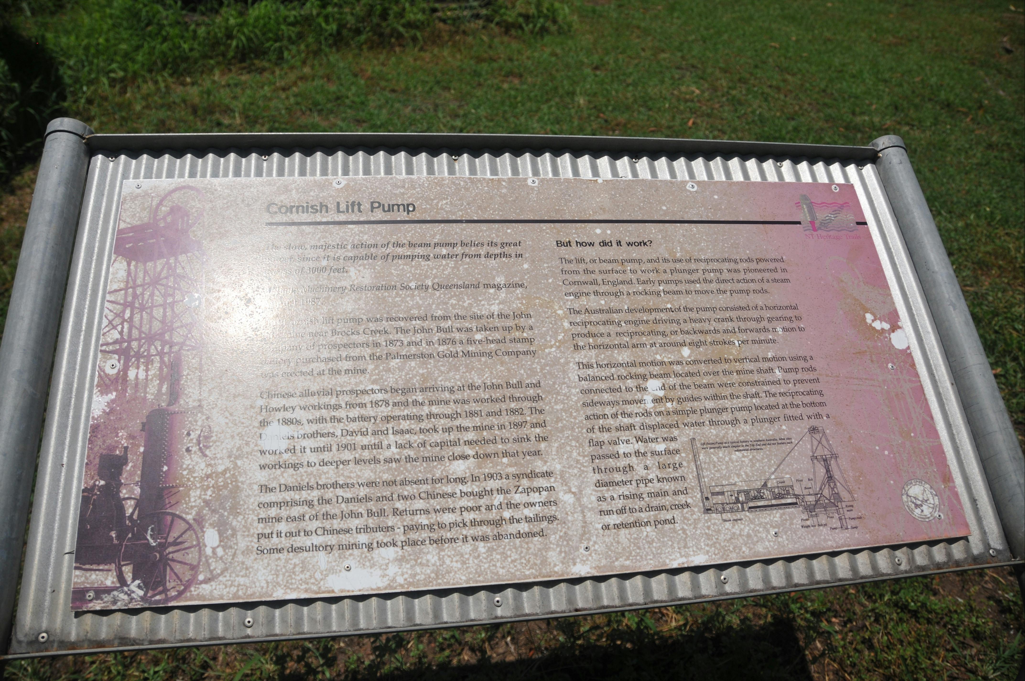 Interpretative panel associated with the mining machinery.