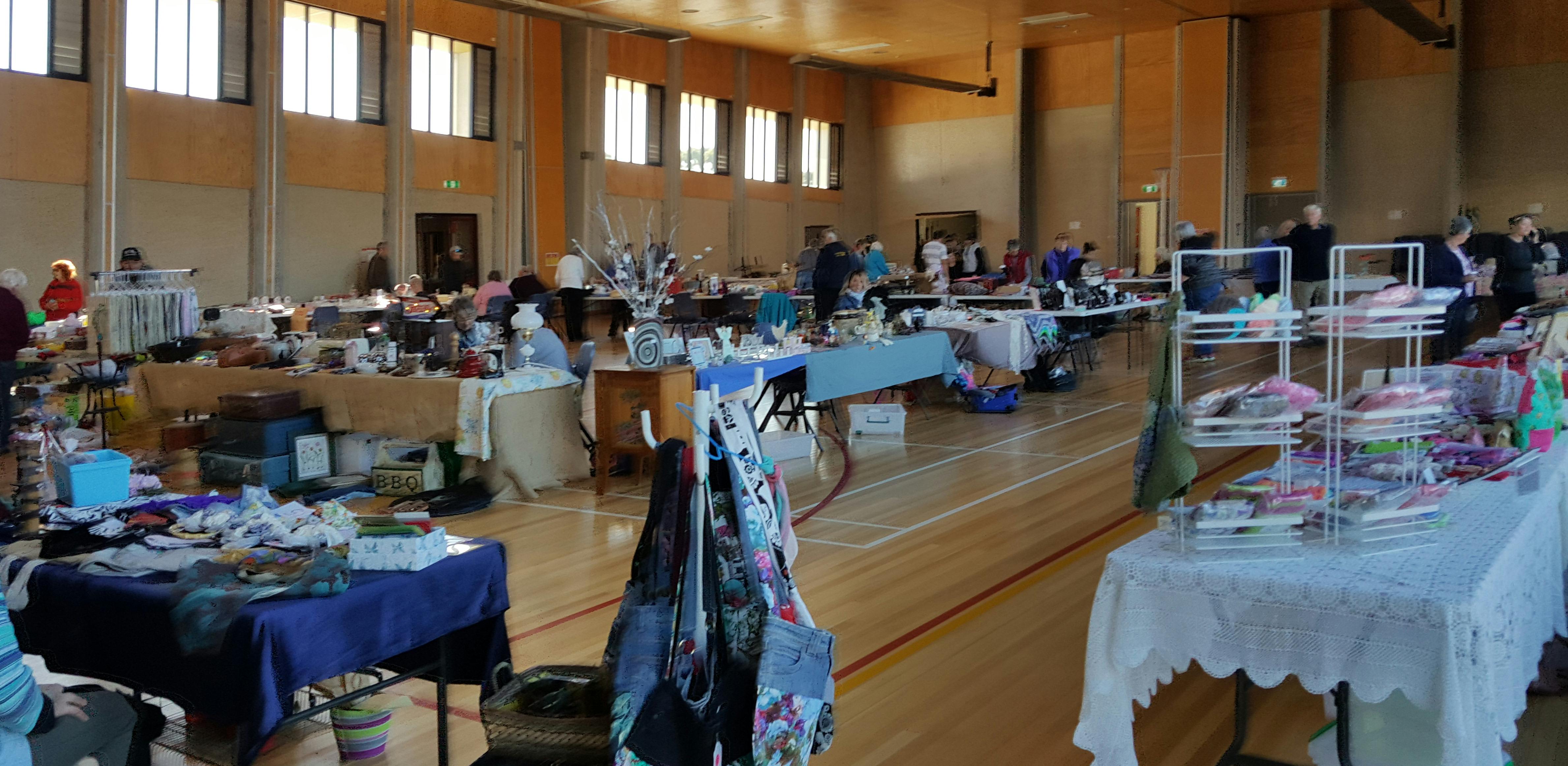 An angled picture looking across the tables in the hall