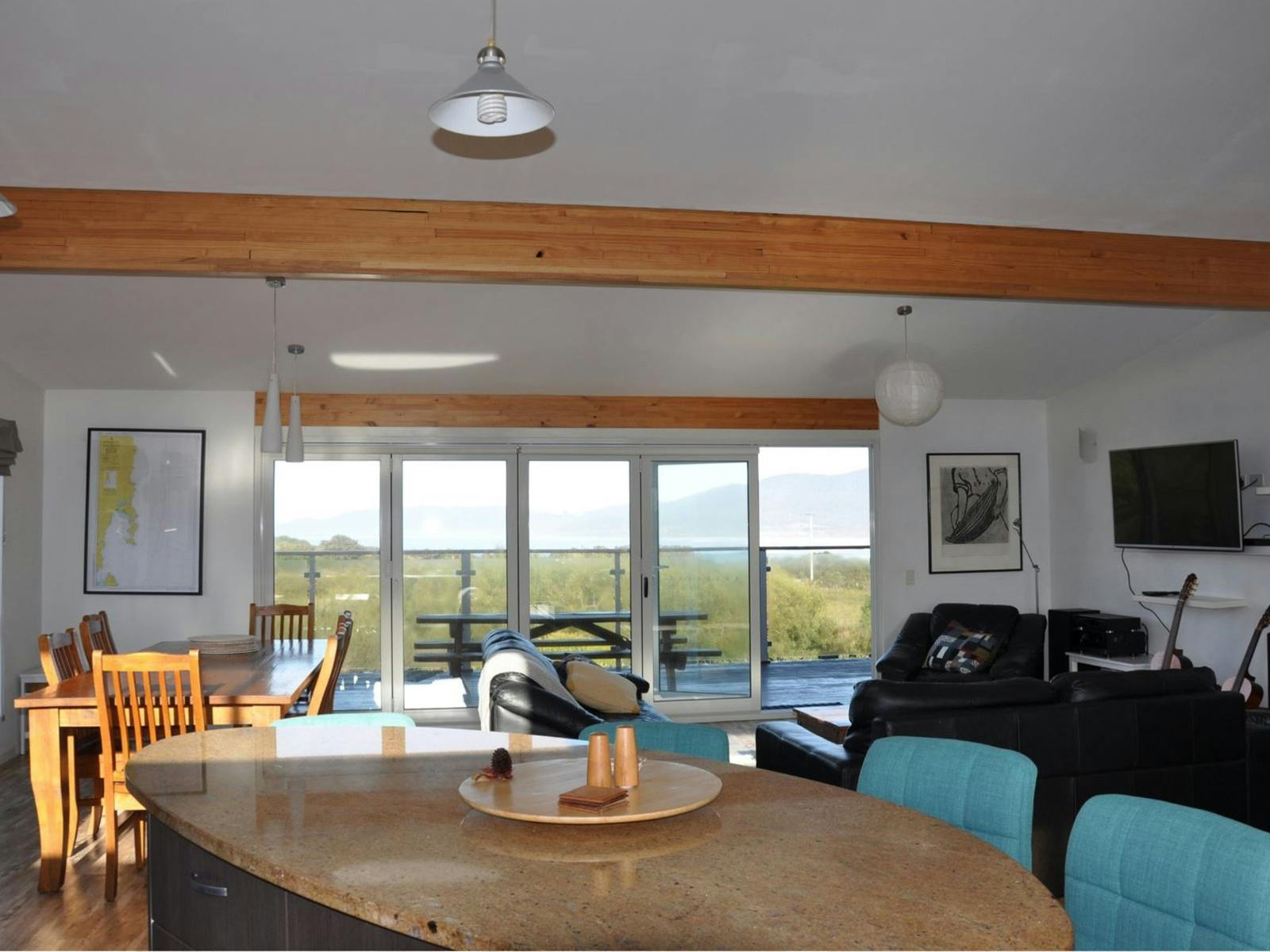Large living space with generously appointed kitchen and views to Maclean Beach
