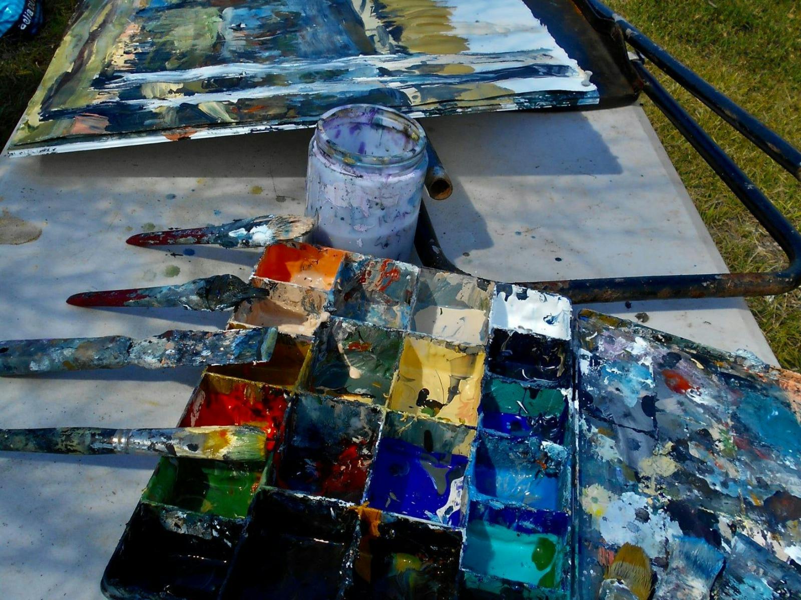 An artist on residency at Coombadjha Art Studio and Gallery