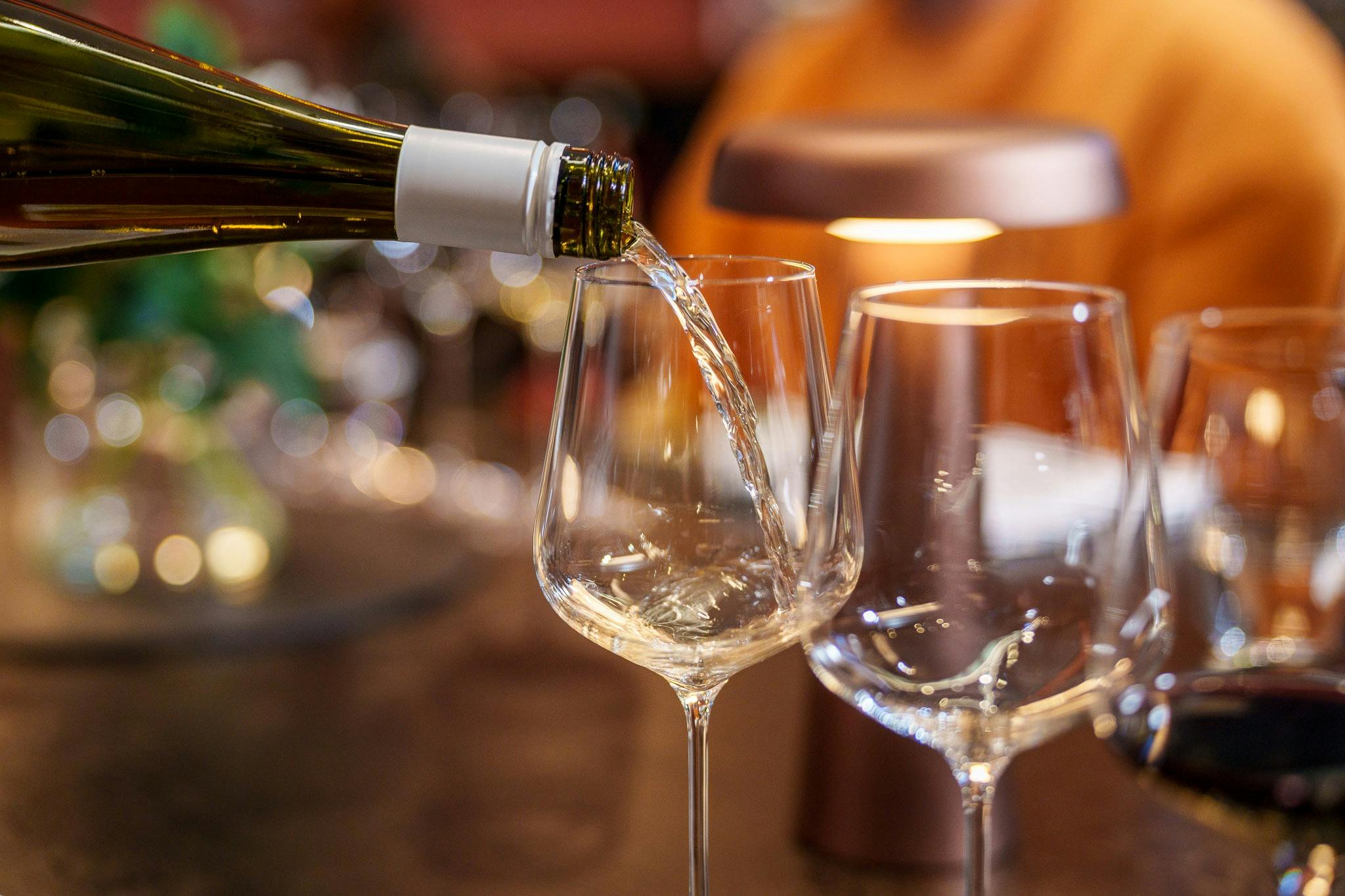 Pouring white wine