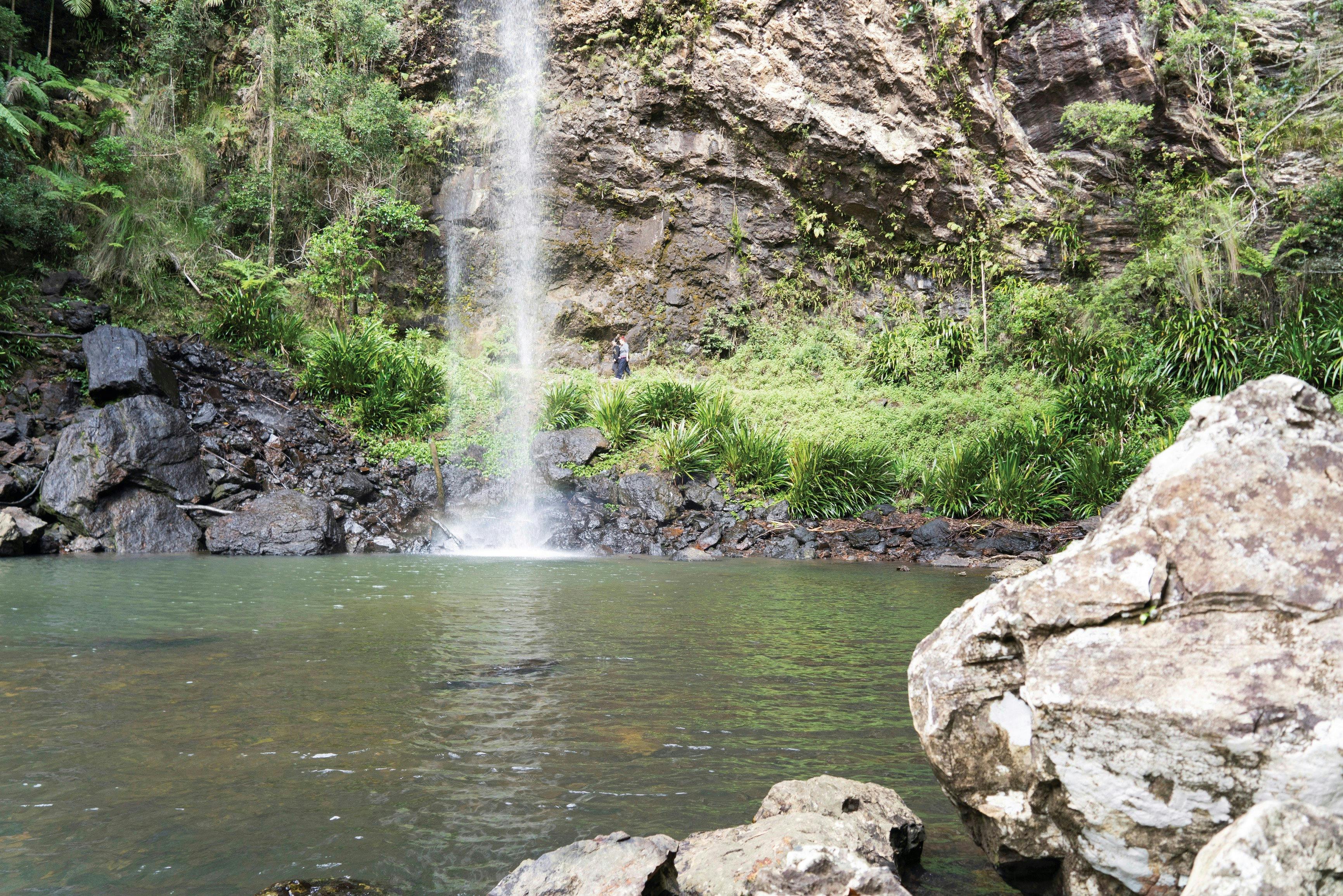 Walk behind two waterfalls.