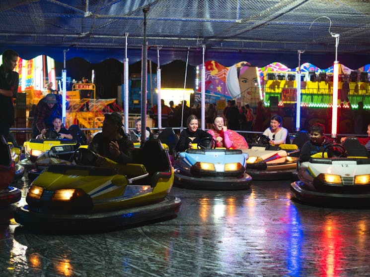 Colorful dodgem car ride in motion