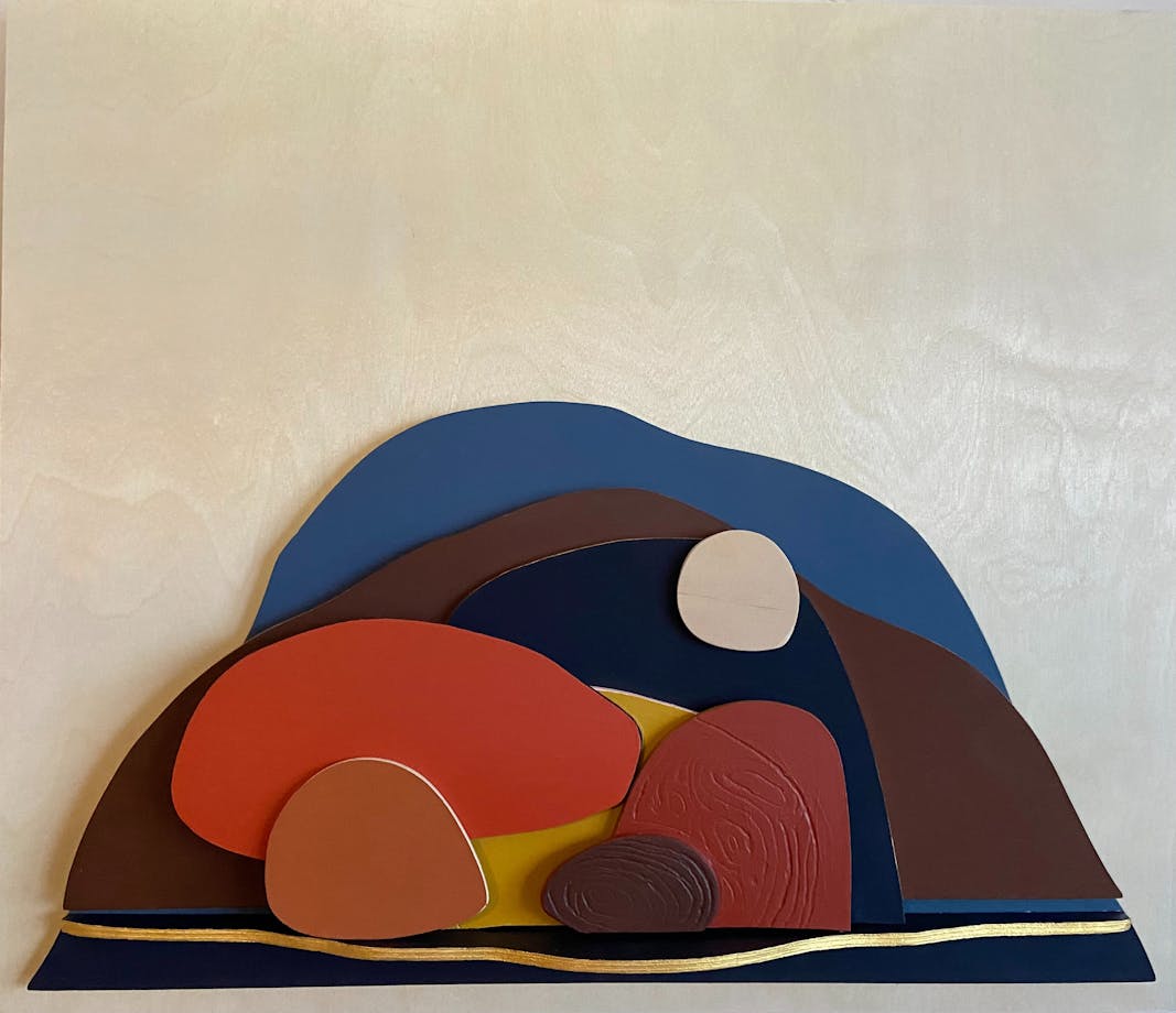 A collage of rounded abstract shapes suggesting a hilly, rocky landscape.