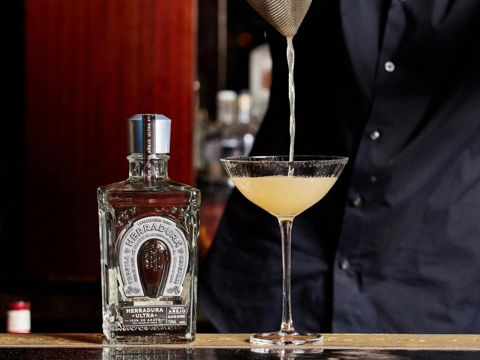 Bartender shaking and pouring Herradura  at Roosevelt Lounge's Herradura Tequila Dinner