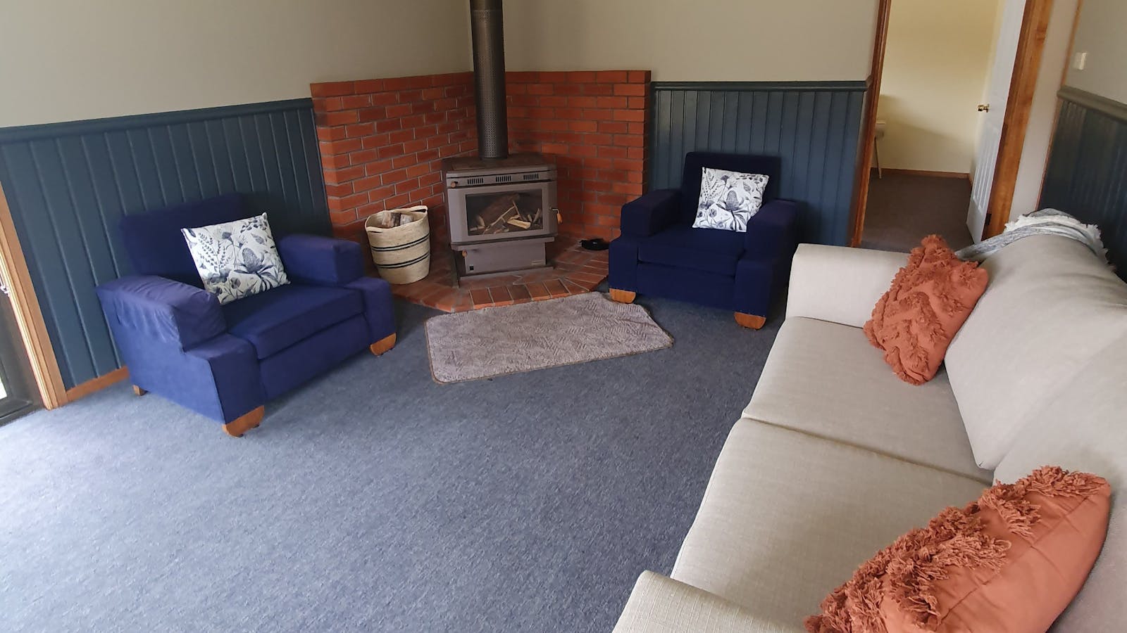 Cosy wood heaters with comfy couches