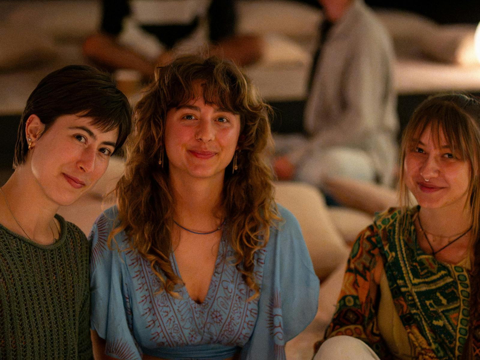 3  women smiling