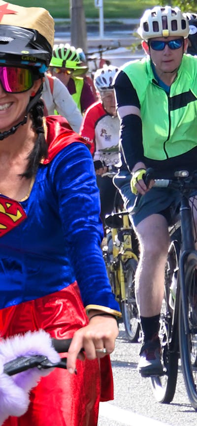 Cyclonats logo and cyclists