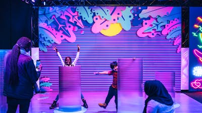 Children enjoying the Illuminate exhibition