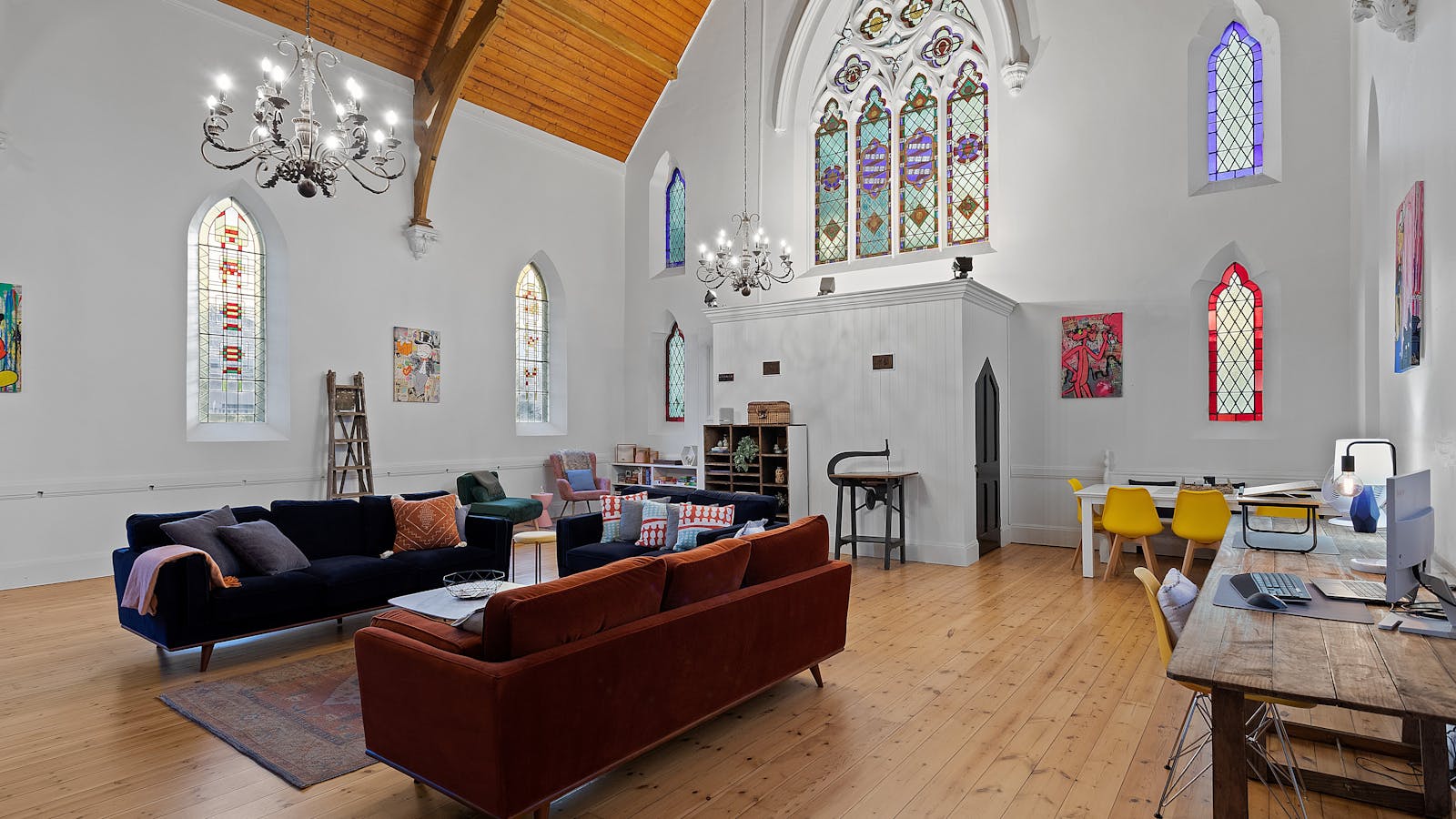 Sanctuary with original stained glass windows