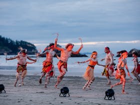 The Tchundal Malar Dance Troupe performing on the beach