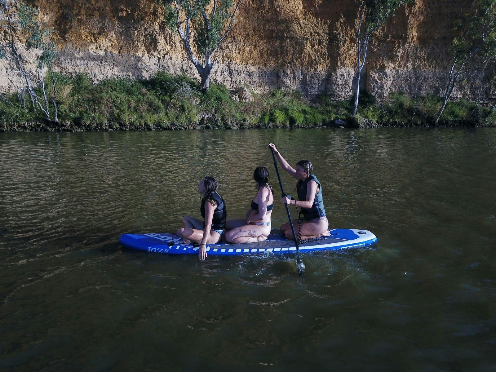 Paddleboarding along the River Murray