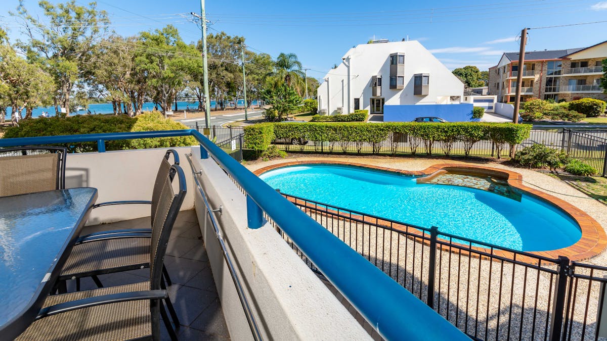 Balcony overlooking pool and Pumicestone Passage