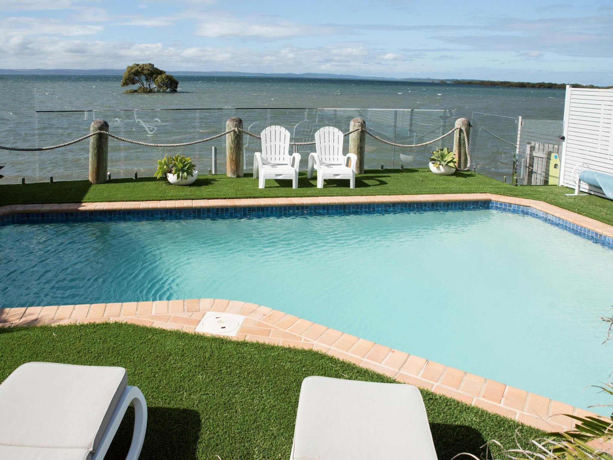 Relax in the sun or take a swim in the heated pool Relax in the sun or take a swim in the heated pool