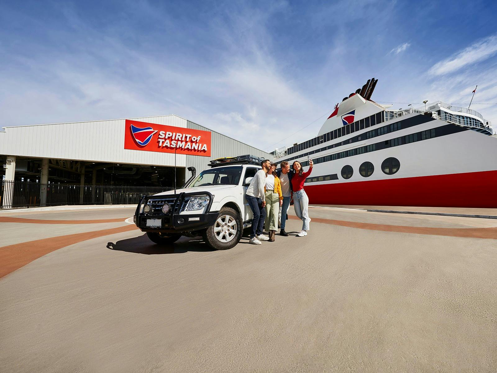 Photo of four friends and a 4WD at the Geelong Terminal