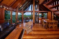 Two Bedroom Treehouse - Kitchen, lounge room and dining area overlooking the mountain