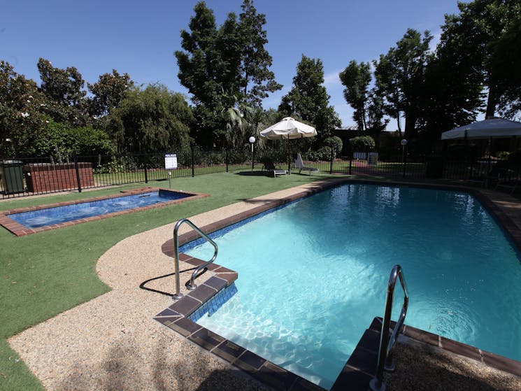 Surrounded by lush gardens and located inside our motel complex, relax in our  Pool an Spa