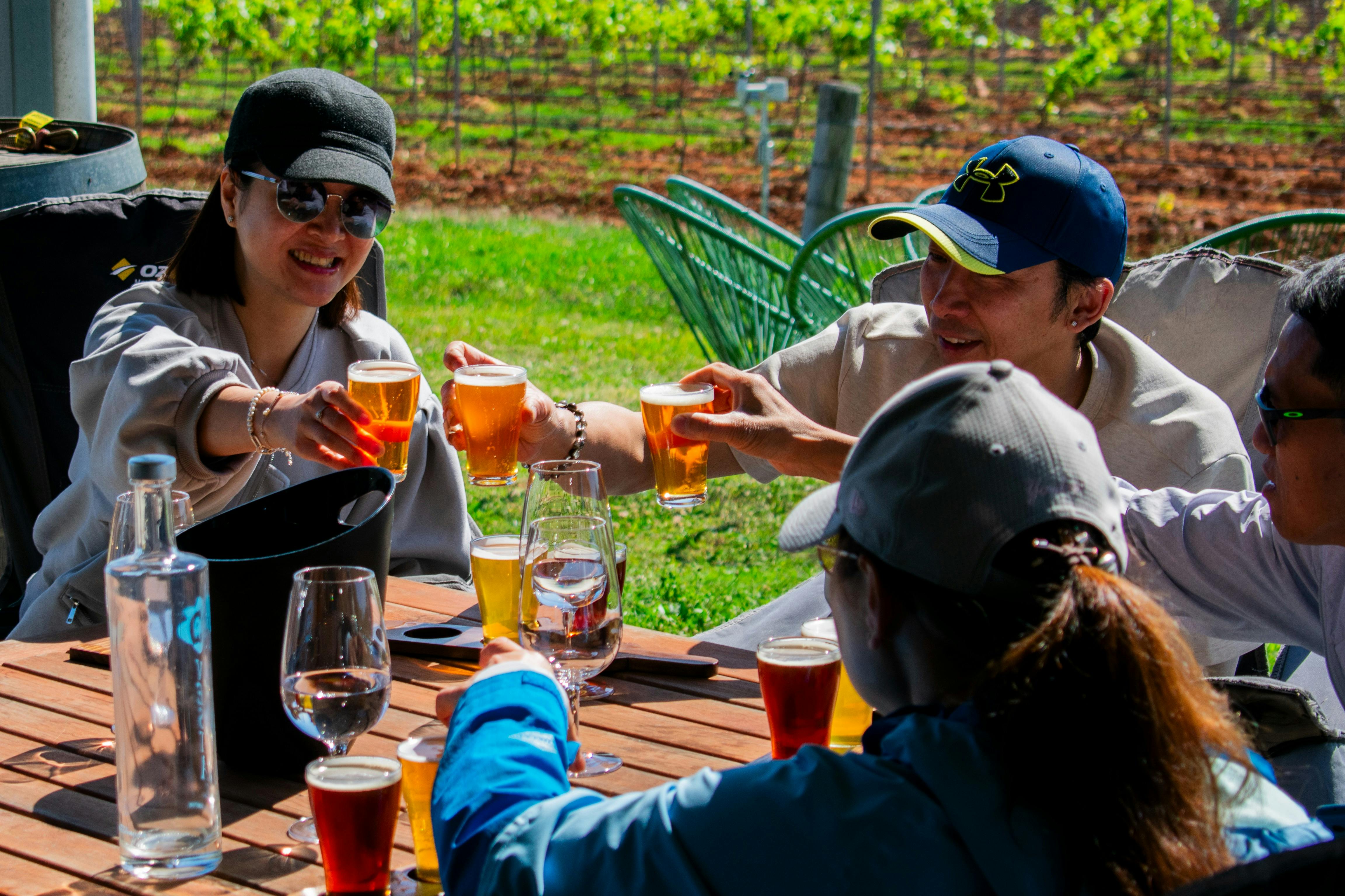 Visitors enjoying craft beer, served by the brewer