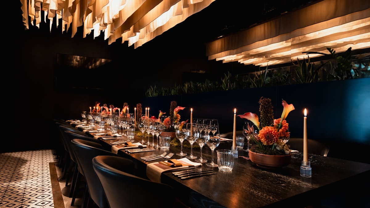 aztecas provate ding room, low lighting, long table, private area