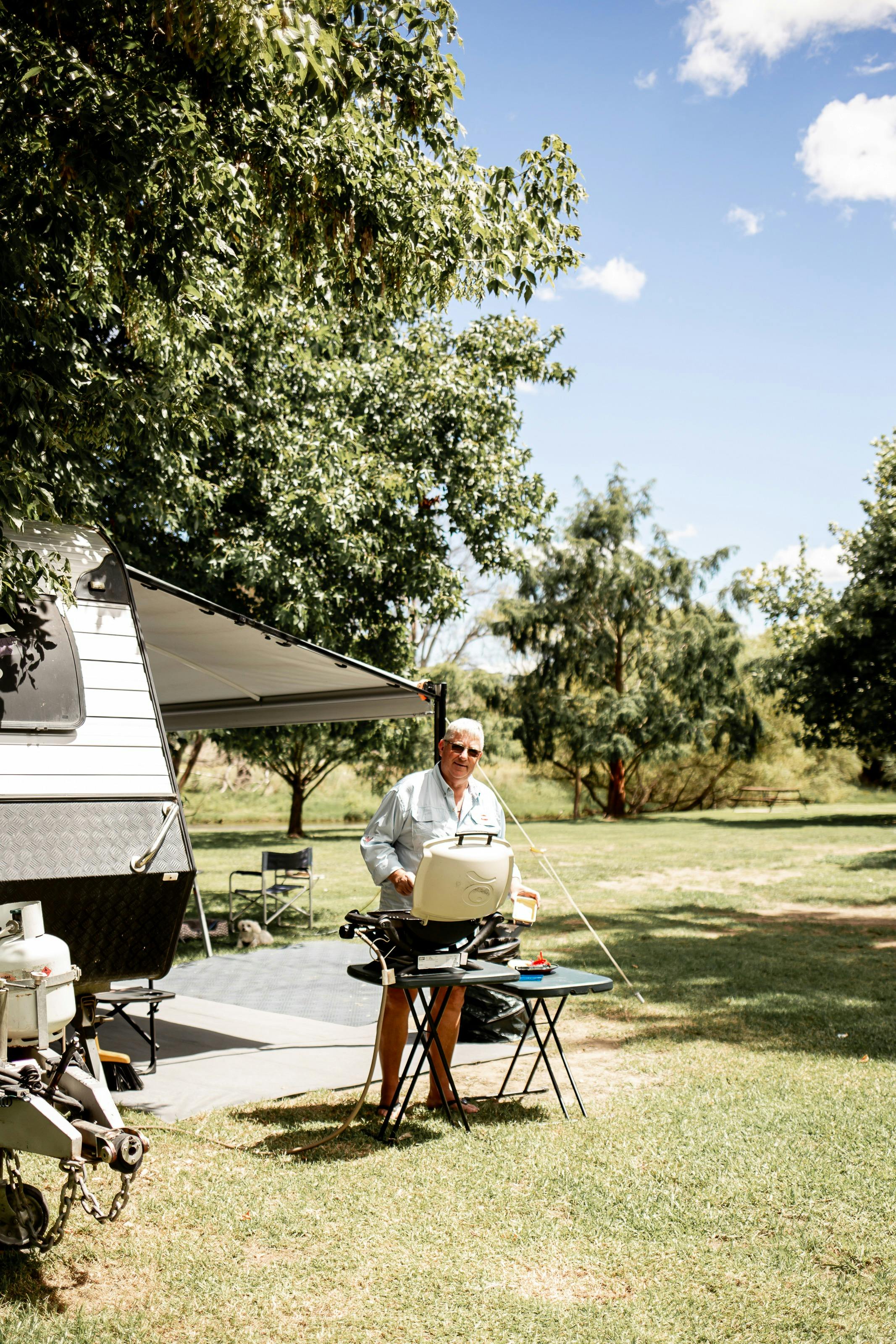 Man cooking with weber