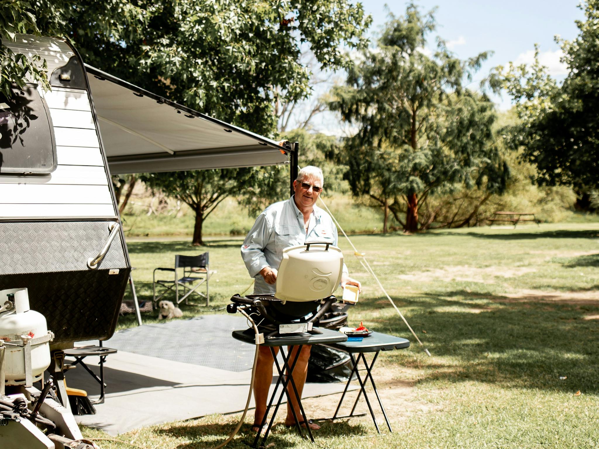 Man cooking with weber