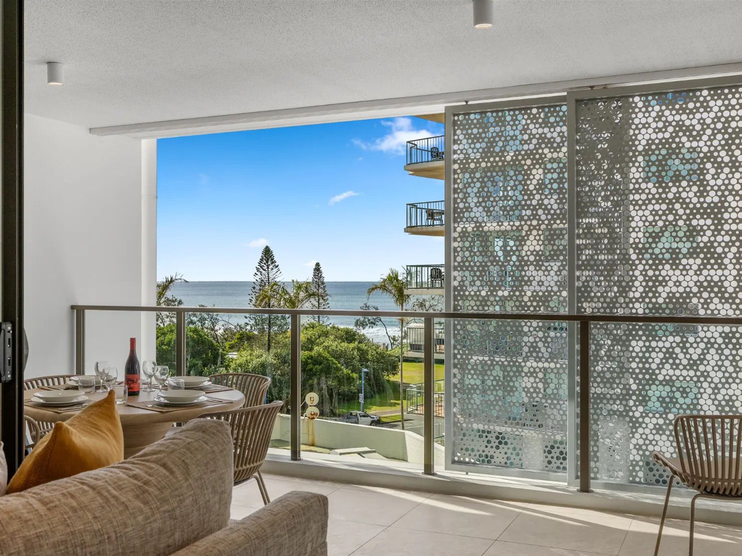Private balcony with outdoor dining and BBQ