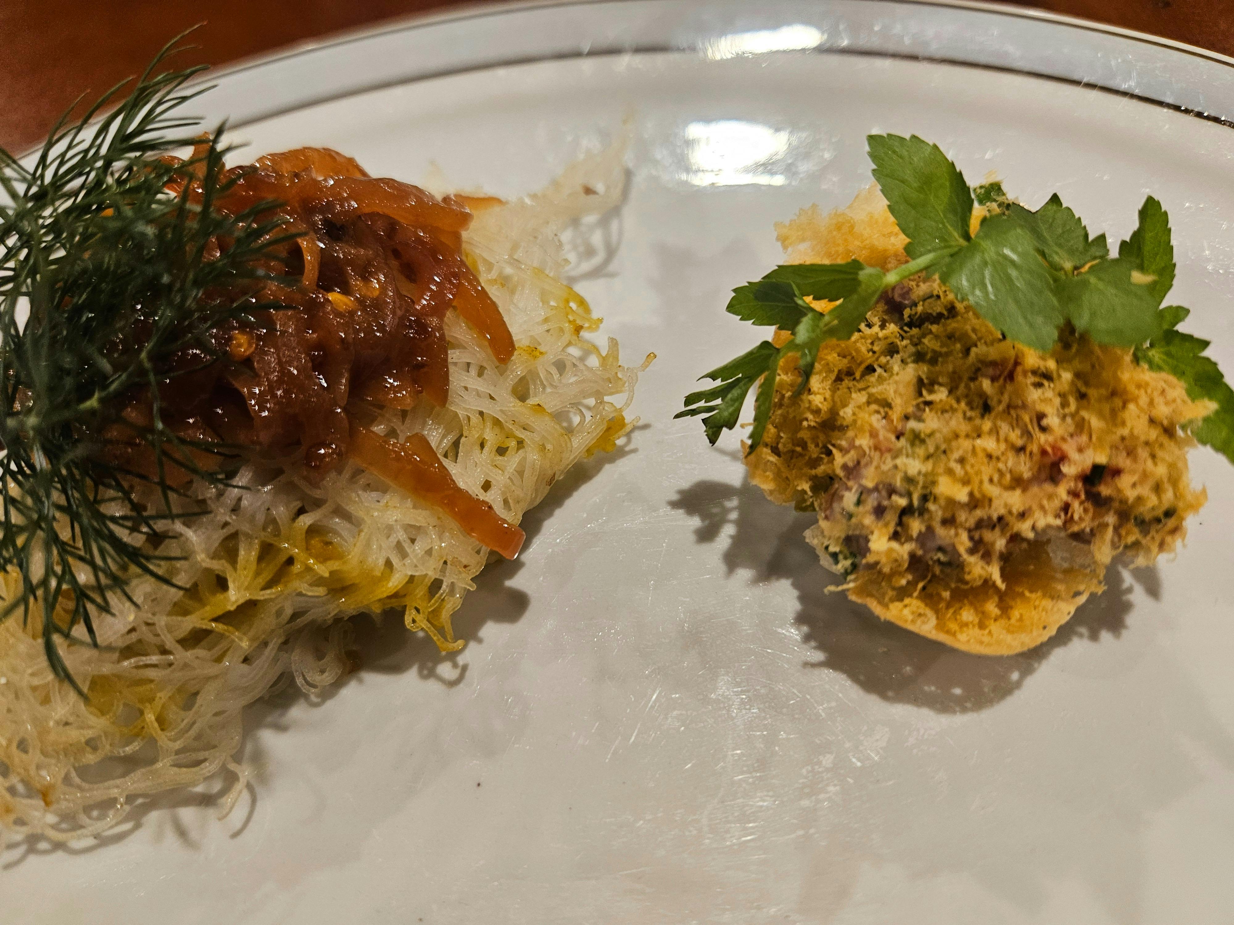 2 canapes served on a plate