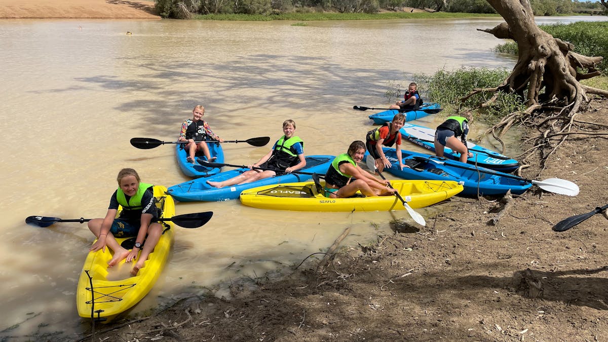 Kayaking near the bridge at Apex Park