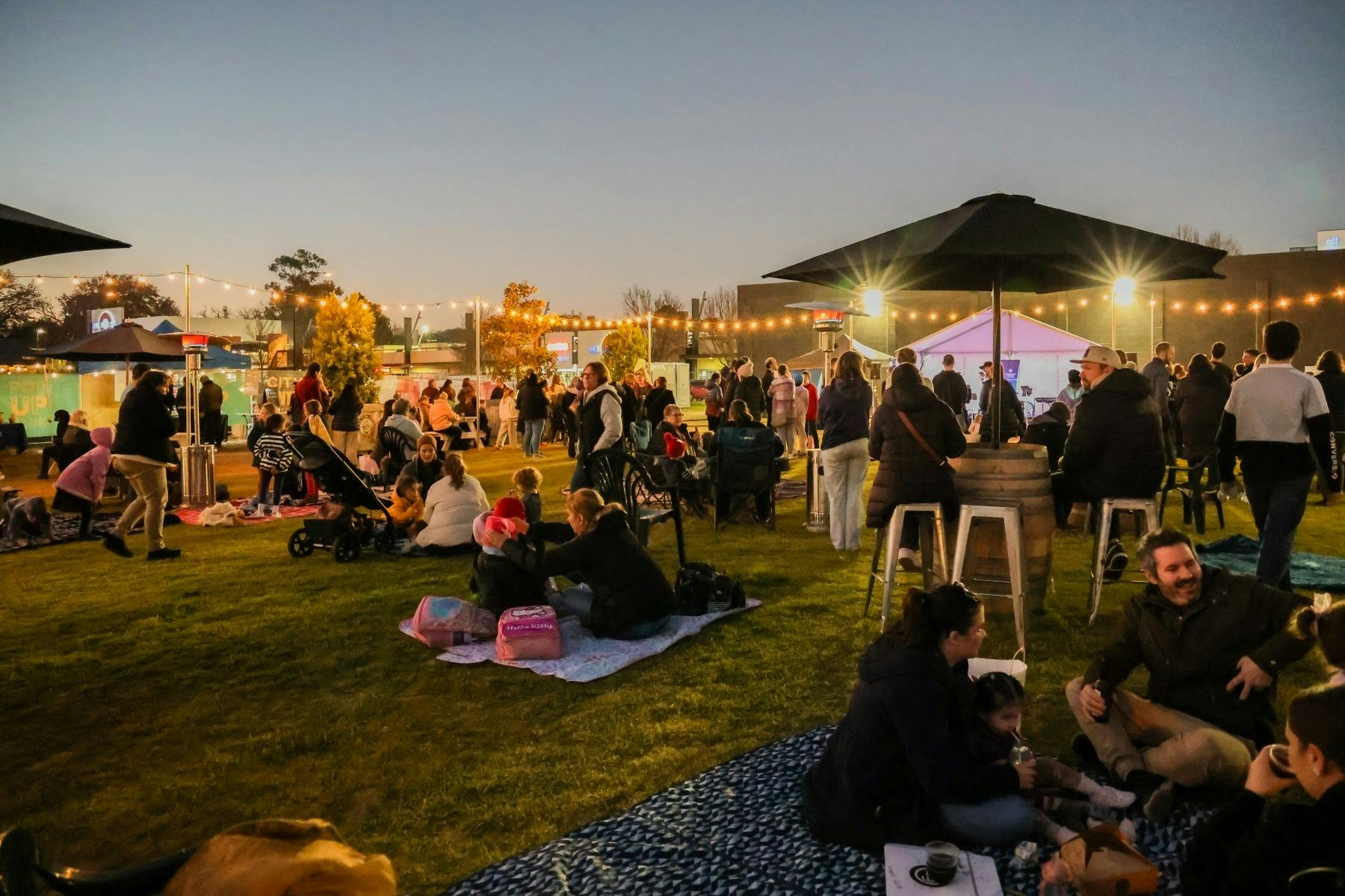 Community enjoying a relaxed night with enterainment