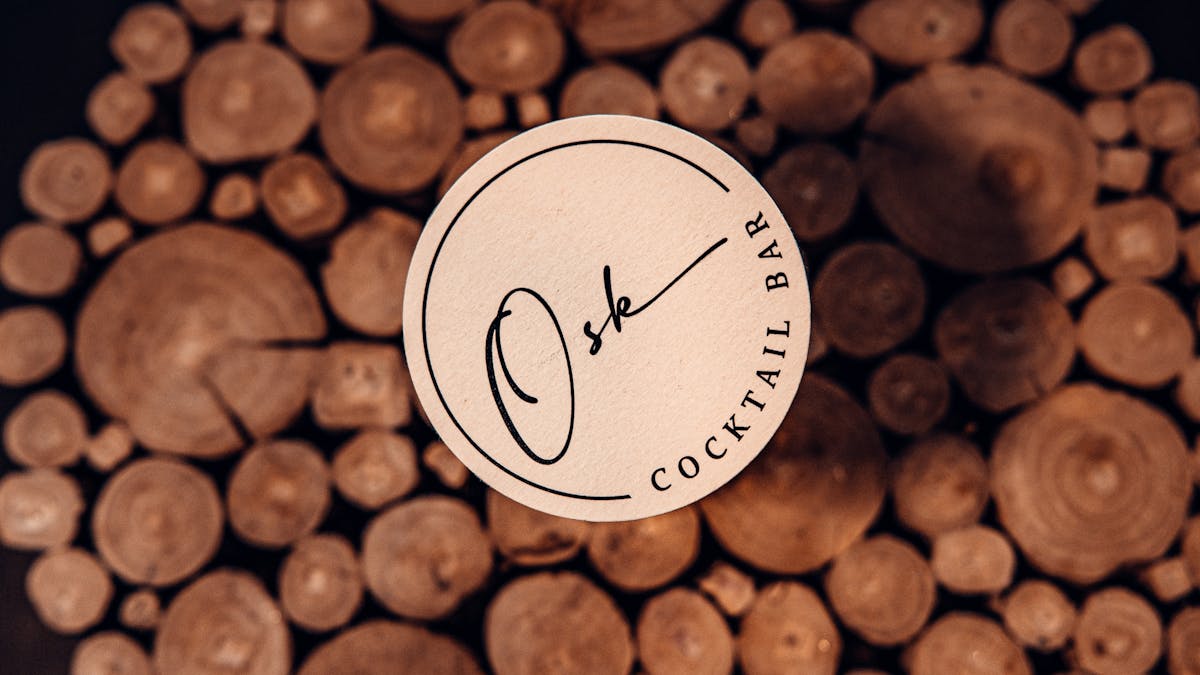 flat lay image of an Osk coaster on a timber stool