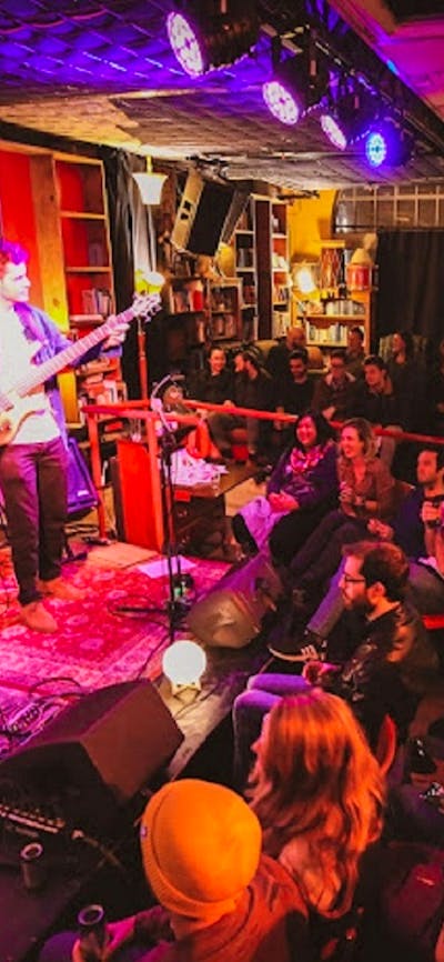 Band onstage at Smith's Alternative in front of an audience