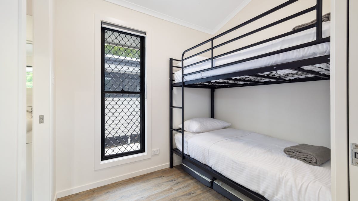 The second bedroom in the two bedroom has a bunk bed