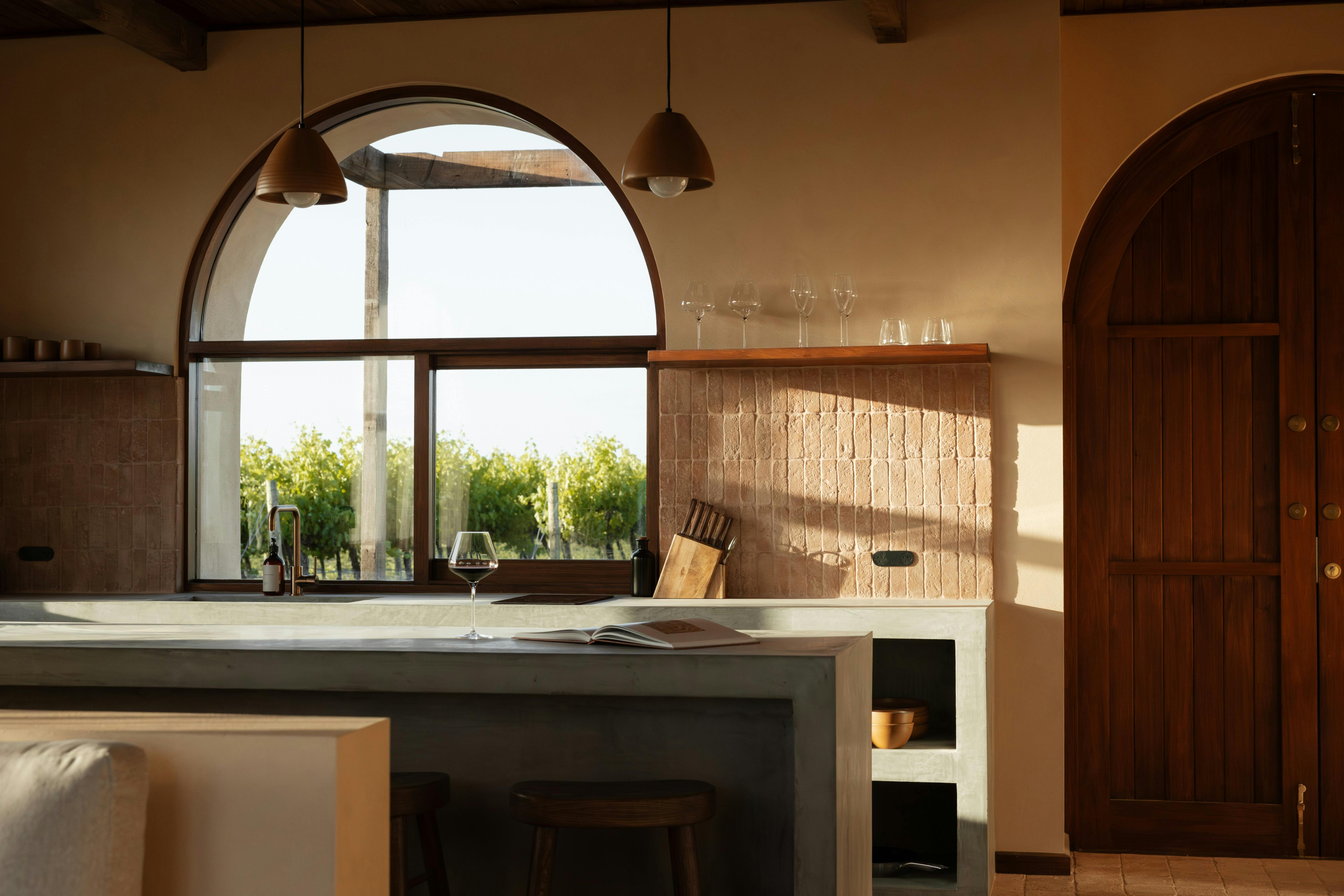 JamFactory pieces are scattered throughout these spaces, including feature pendant lighting.