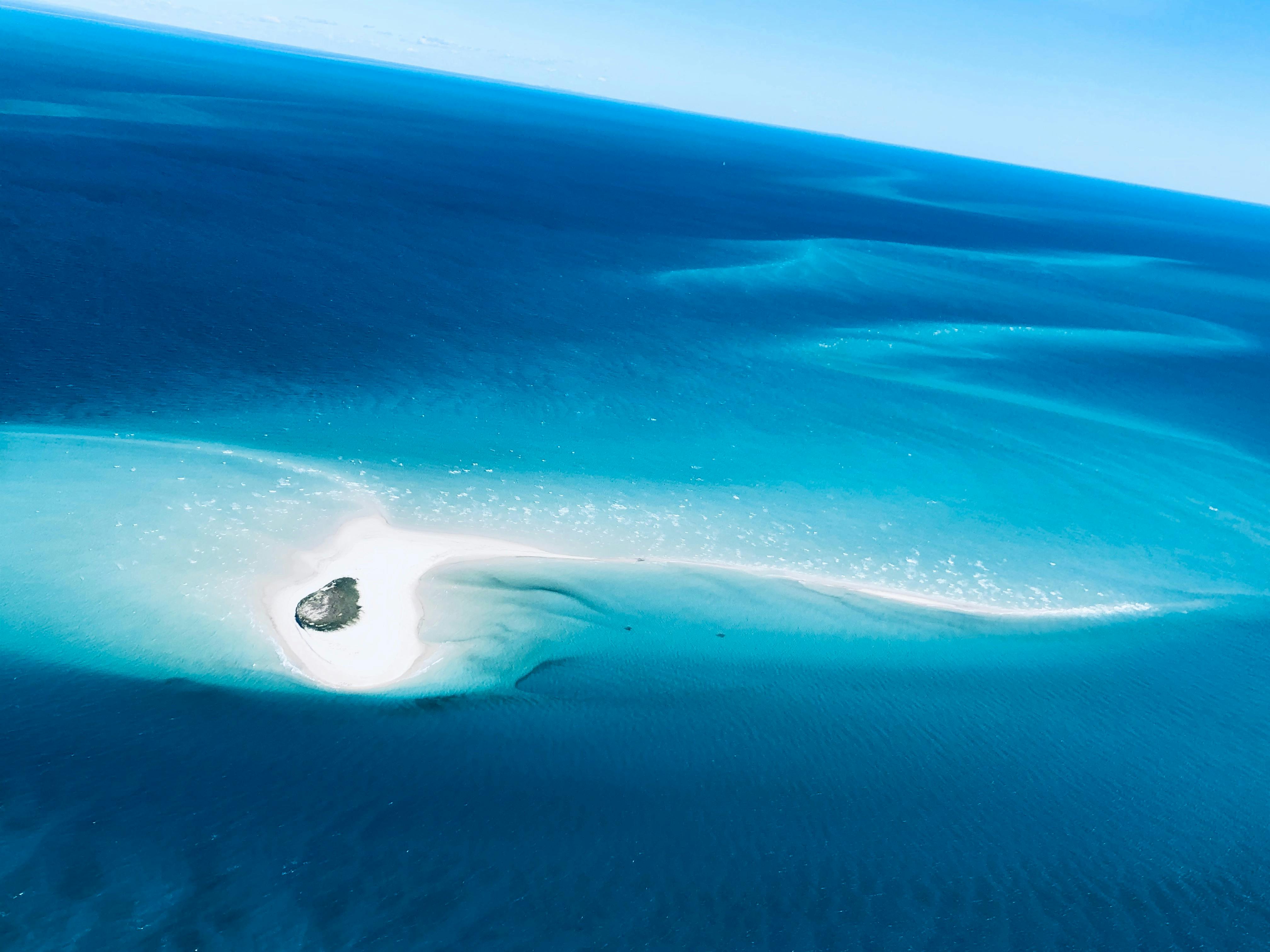 Helicopter Flying over Pelican Banks on low tide