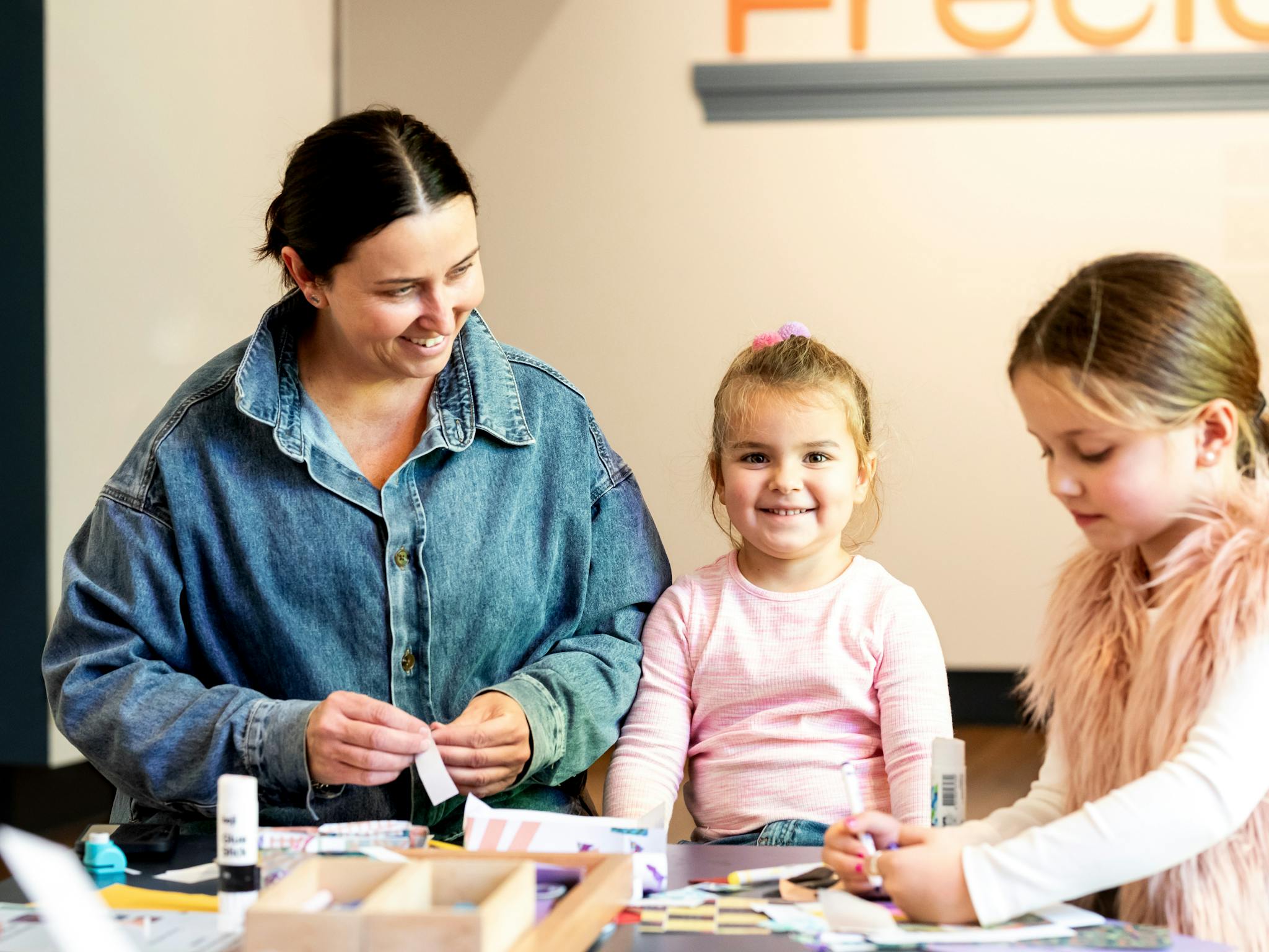 Little girls hanging out with their mum at the Museum and making different crafts Little girls hanging out with their mum at the Museum and making different crafts