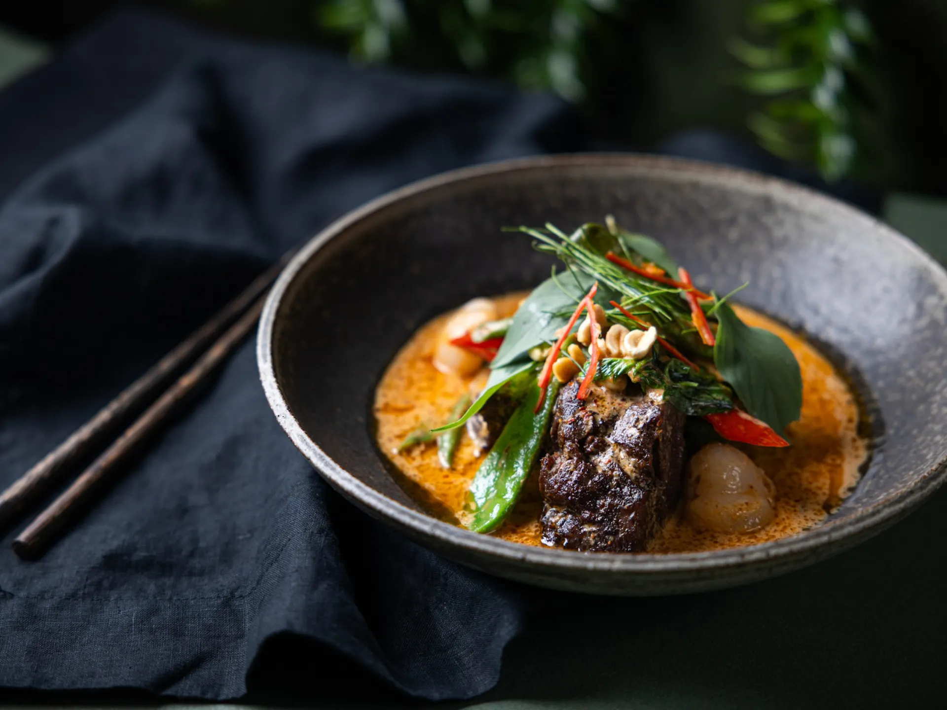 Red curry of slow cooked beef, lychee, wild ginger, roasted peanuts