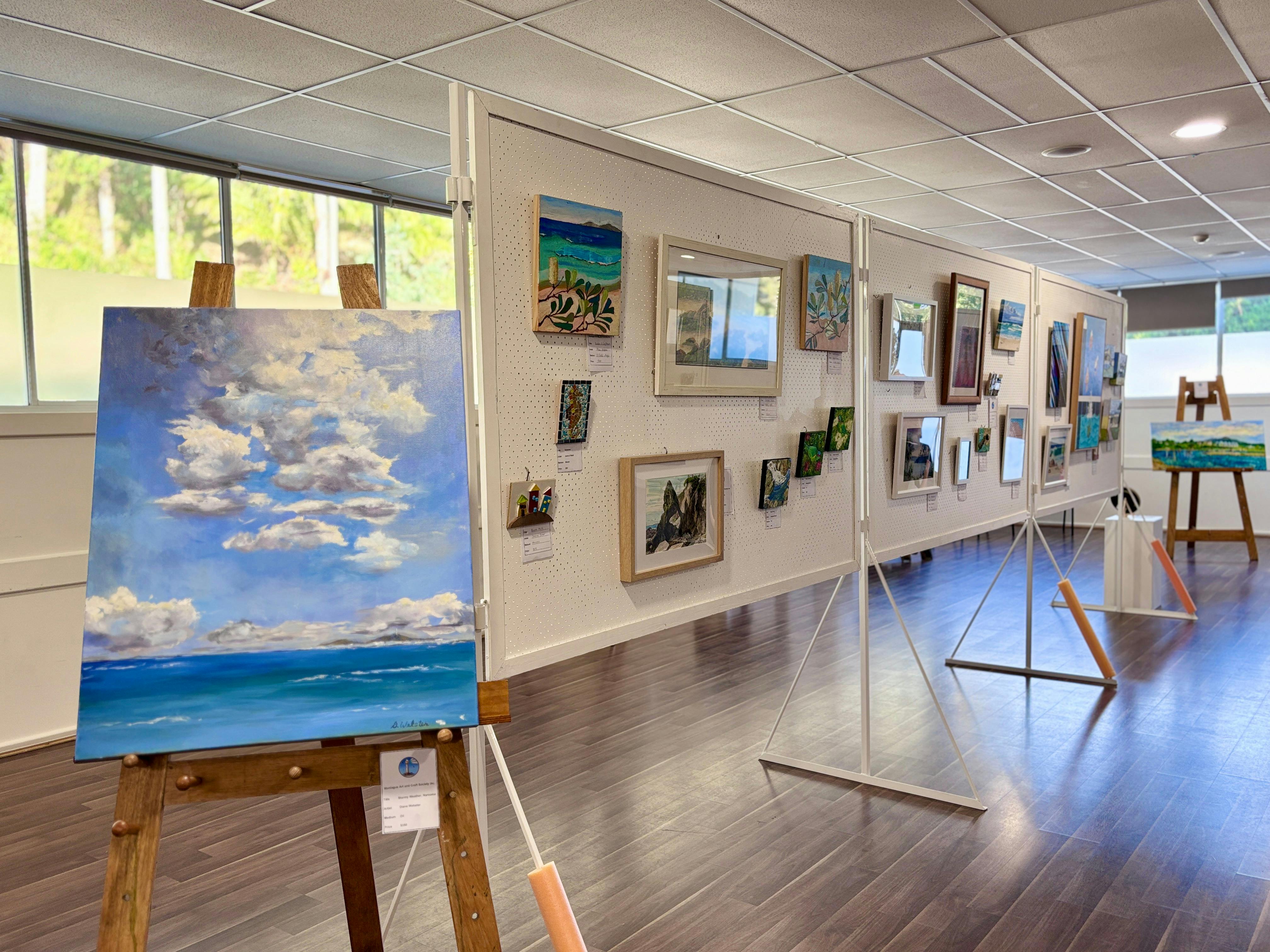 a selection of paintings displayed as part of the annual art exhibition held over Easter 2025