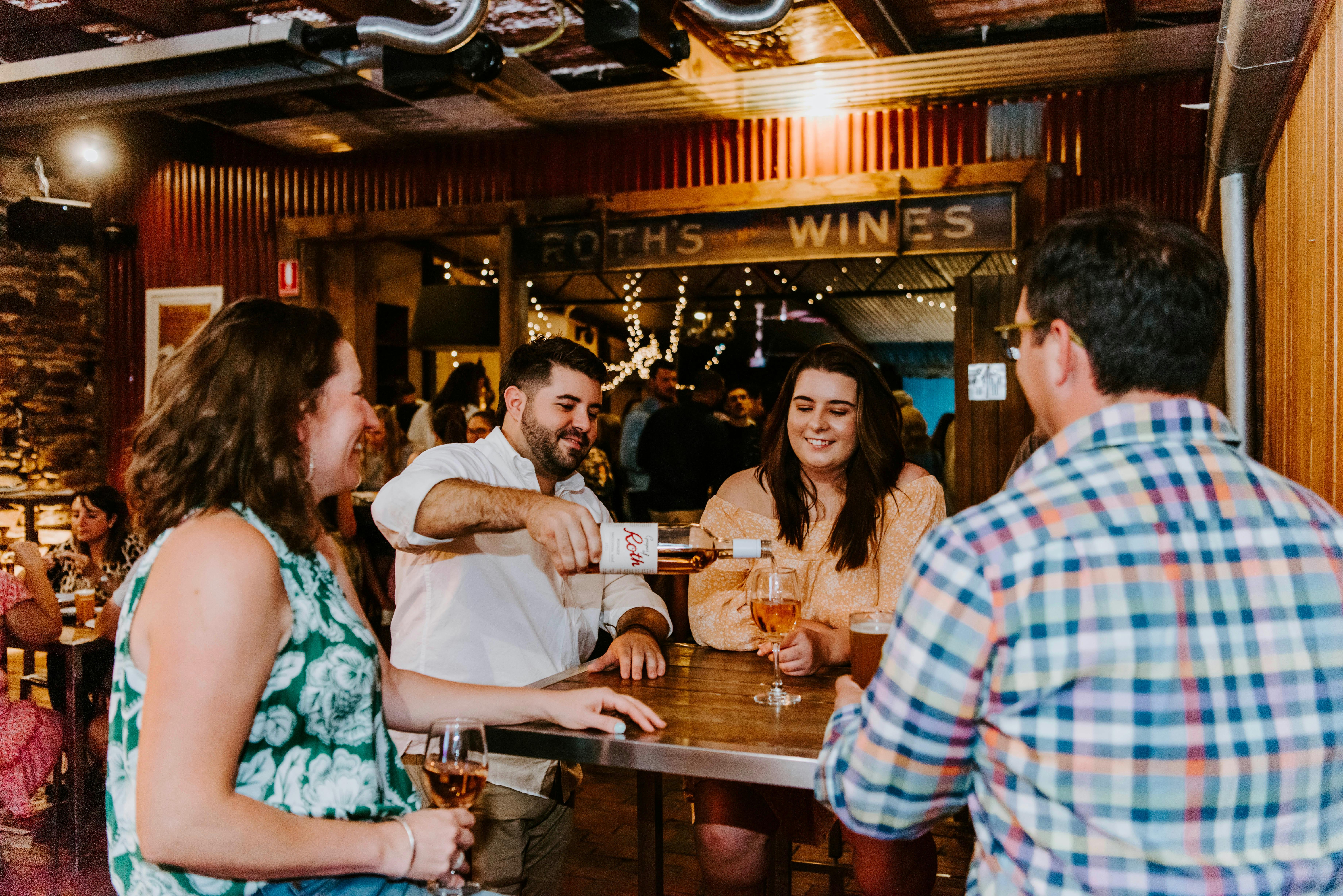 Group enjoying our house label - Grapes of Roth Sangiovese Rose