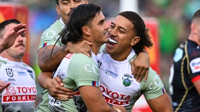 Canberra Raiders players Ata Mariota and Kaeo Weekes celebrating.