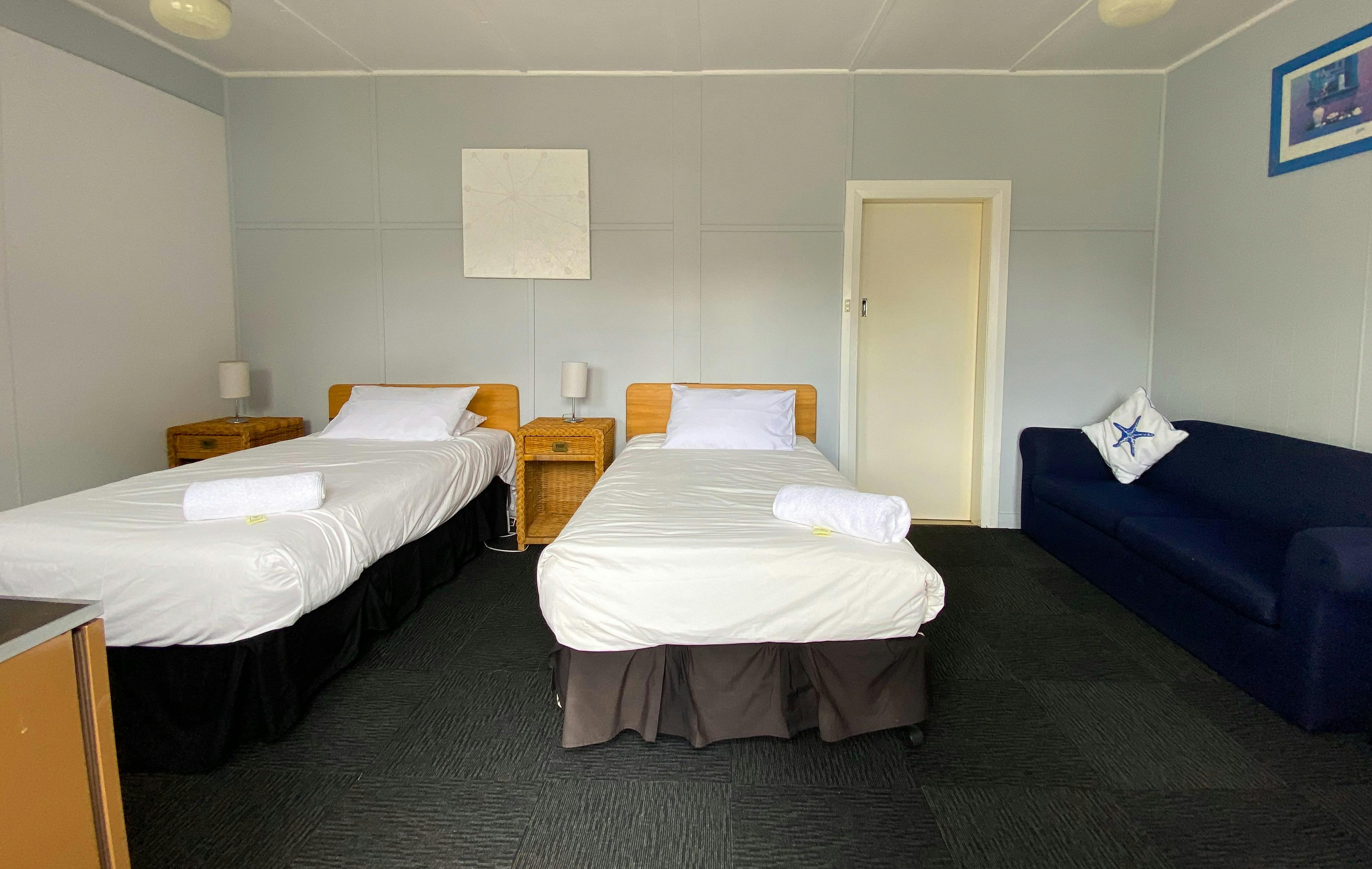 Two Single Beds within Motel room
